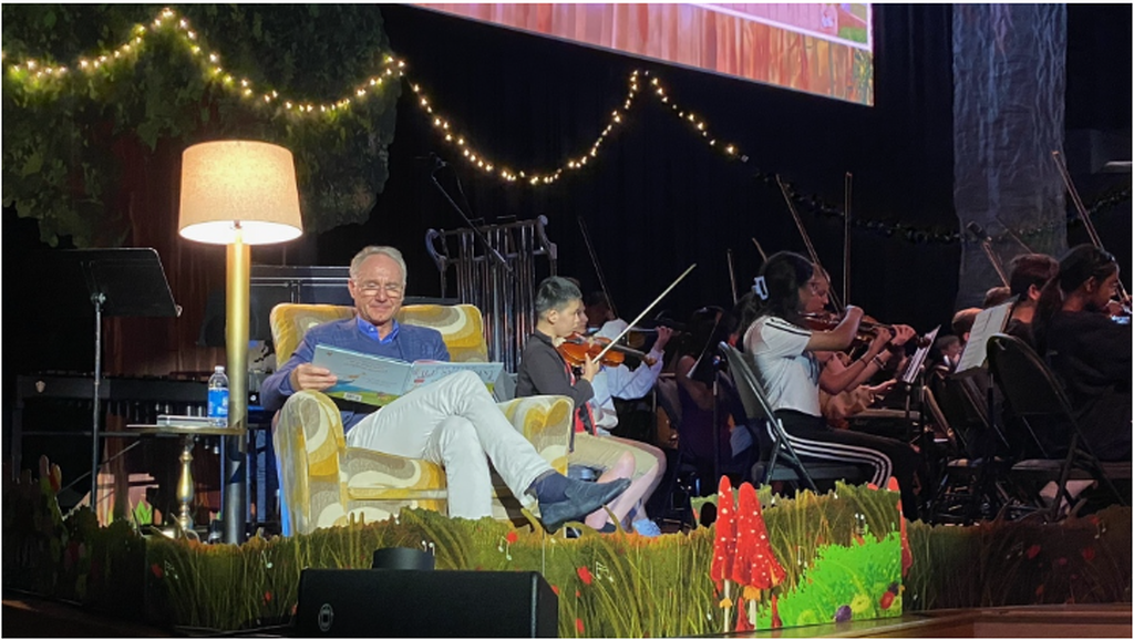 N.B. news: Dan Brown moved by youth orchestra performances